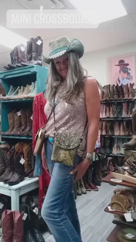 video of christhompsonbags showing 2 small mini purses